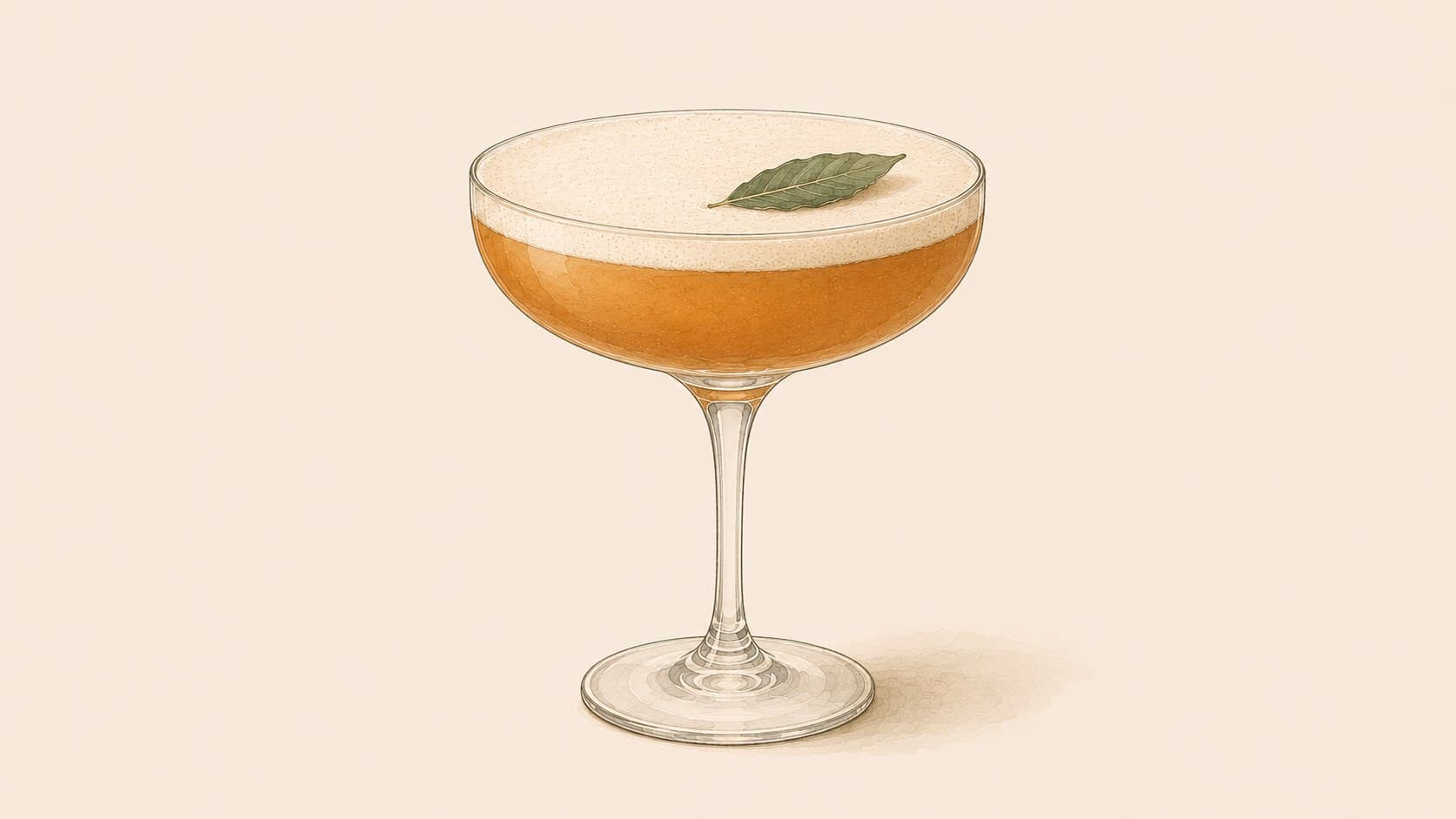 An amber cocktail with a thin foam cap, mint and an edible flower, in a coupe glass